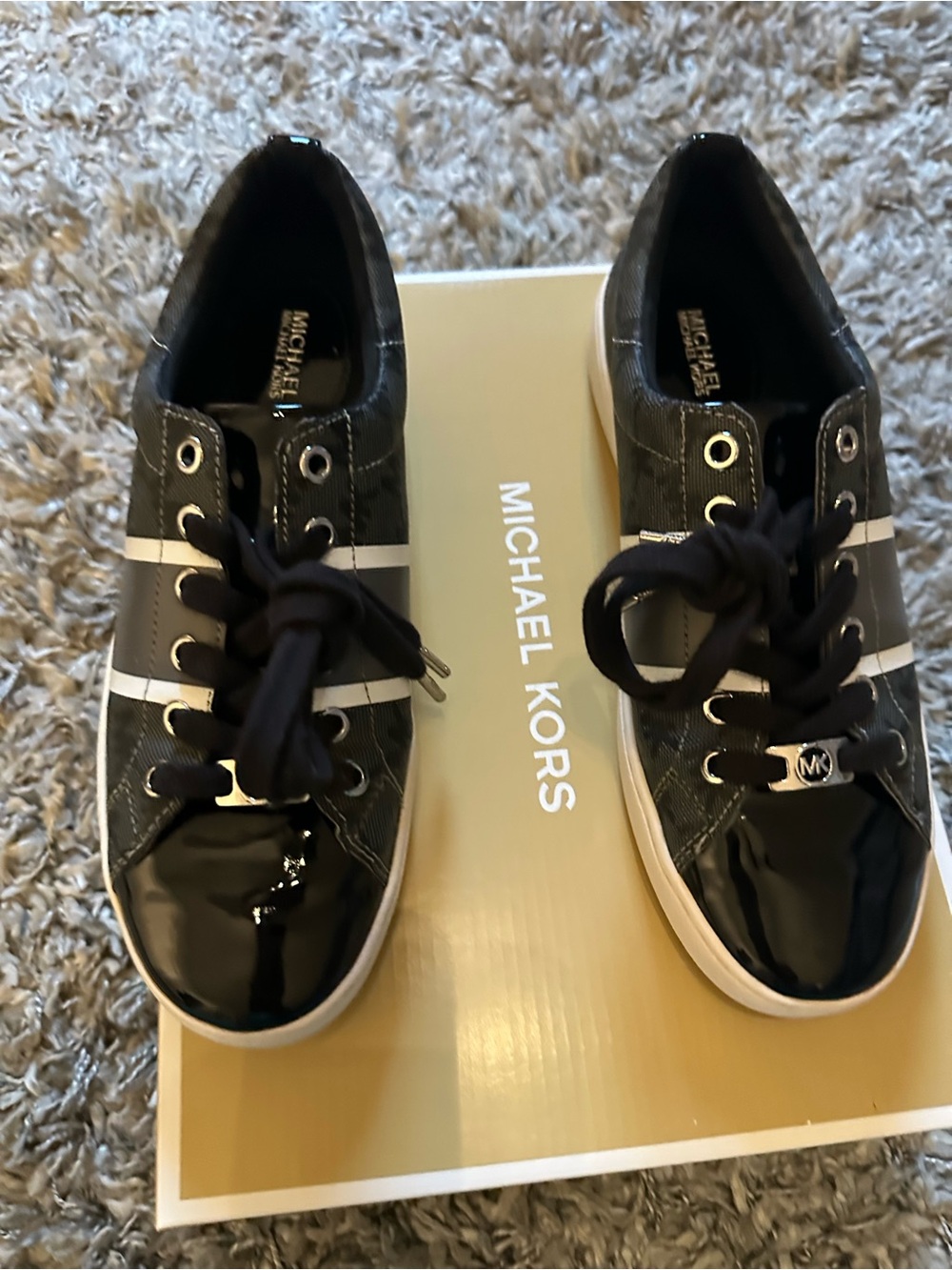Michael Kors women’s Black & White Low-Top Sneakers